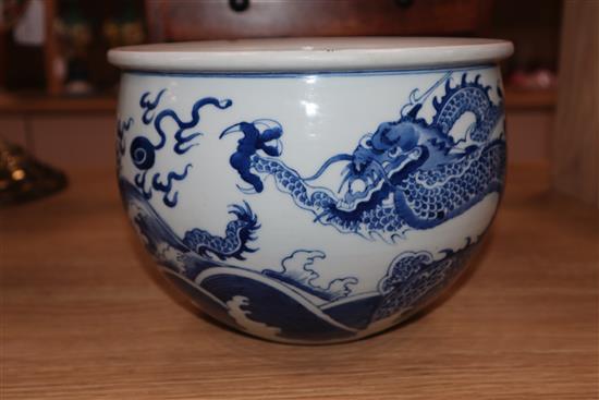 A Chinese blue and white dragon jardiniere height 16cm